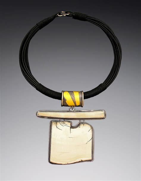 Fossilized Ivory With Silver And 22k Gold On Leather And Linen Bone