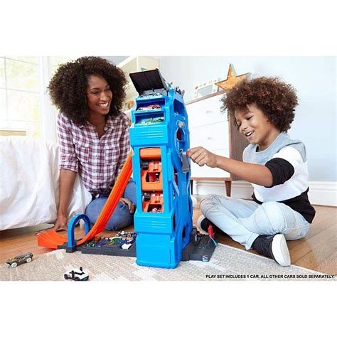 Hot Wheels Torre Garage Enorme Playset Per Macchinine Con Pista Da Corsa A Corsie Include