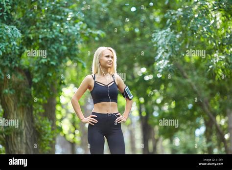 Girl Runner Blonde Portrait In The Park Stock Photo Alamy