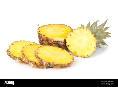 Pineapple slices isolated on white background Stock Photo - Alamy