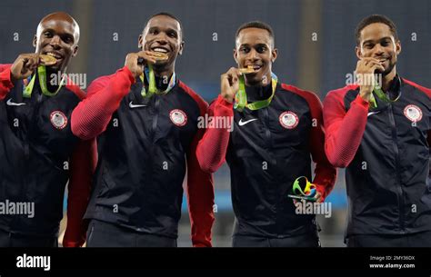 The United States Mens 4x400 Meter Relay Team Members Lashawn Merritt