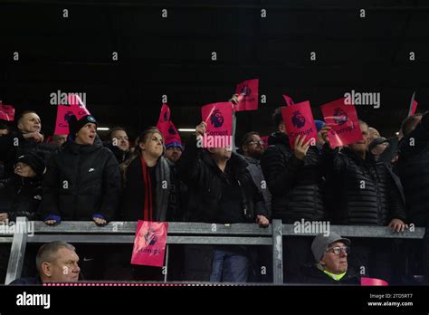 Everton Fans Hold Up Corrupt Premier League Signs During The Premier