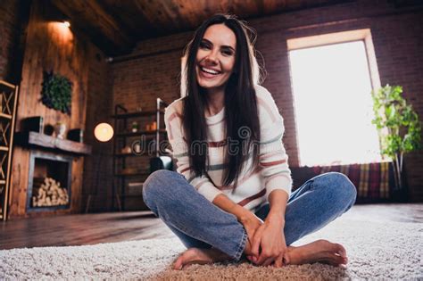 Photo Of Girlish Pretty Lady Dressed Striped Pullover Sitting Floor