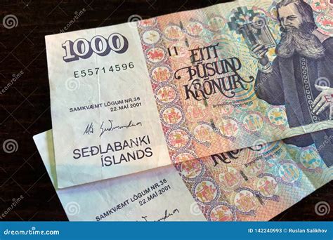 Icelandic Cash Money Of Iceland 1000 Icelandic Krona Bills On Wooden