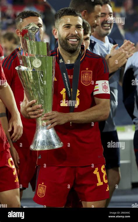 Jordi Alba Of Spain Celebrates The Victory With The Trophy Following