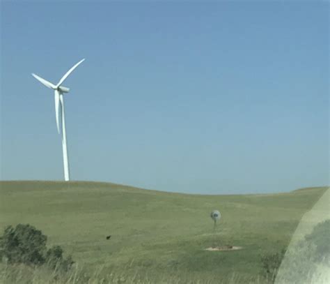 Big windmill and little windmill in western Kansas. : r/mildlyinteresting