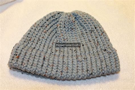 Adult Blue Hat with brown and black specs on Storenvy