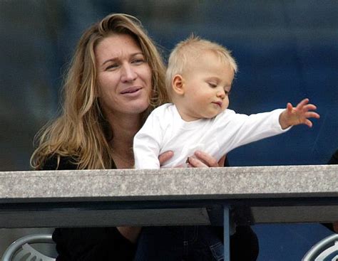 Steffi Graf and her son Jaden Gil watch as Andre A Pictures | Getty Images