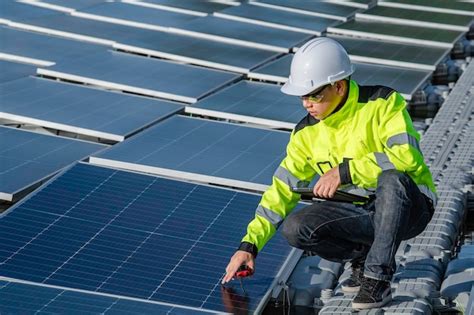 Premium Photo | Asian engineer working at Floating solar power ...