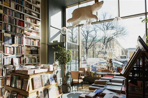 Modern style interior of bookstore in sunlight · Free Stock Photo