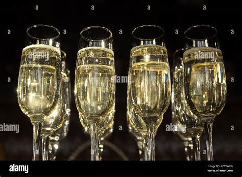 Cool Champagne Is Poured Into Glass Glasses Condensation On The Glass