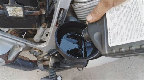 How To Change Engine Oil And Filter On A Honda Transalp Xl V Youtube