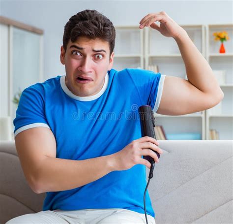 Man Sweating Excessively Smelling Bad At Home Stock Image Image Of