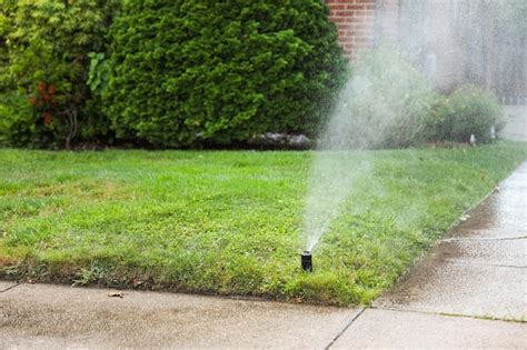 Premium Photo Sprinklers Nourish Lush Grass A Metaphor For Growth