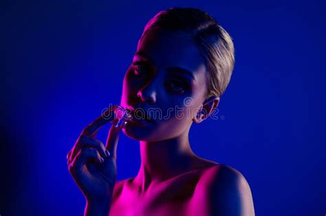 Photo Of Attractive Lovely Woman Touch Ice Cube Face Lips Naked Shoulders Isolated On Blue Neon