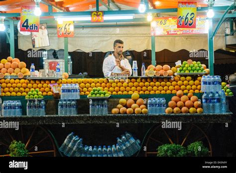 Orange juice seller at the Jemaa El-Fna Fnaa (Big Square) at night ...