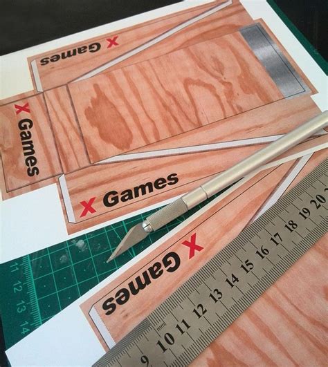 Several Pieces Of Wood Cut Out To Look Like Game Boards With Rulers And