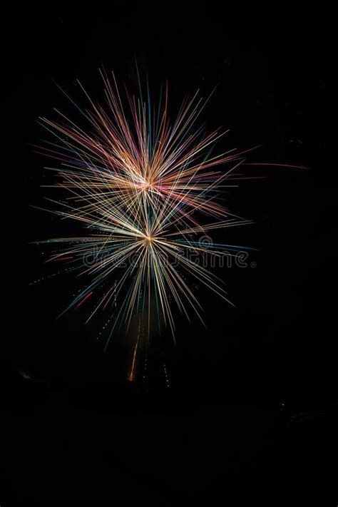 Fireworks in the night sky stock image. Image of fell - 189505593