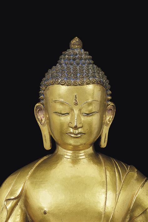 A RARE GILT BRONZE FIGURE OF BUDDHA RATNASAMBHAVA NEPAL 17TH 18TH