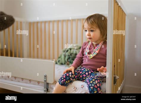 Little girl playing in the bedroom at home Stock Photo - Alamy