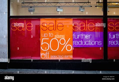 Sale Signs In Shop Window Stock Photo Alamy