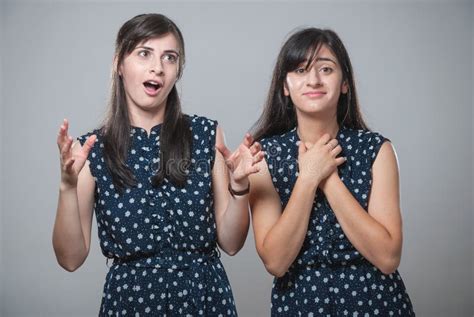 Two Sisters With Funny Faces Stock Photo Image Of Human Arguing