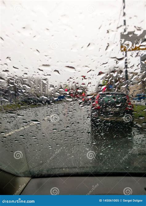 Raindrops On The Windshield View From Inside The Car Stock Image