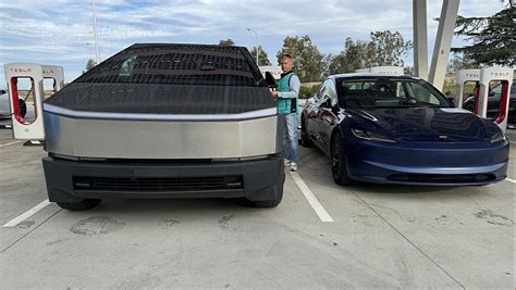 New Tesla Model 3 Gets Dwarfed by the Cybertruck While Resting at a ...