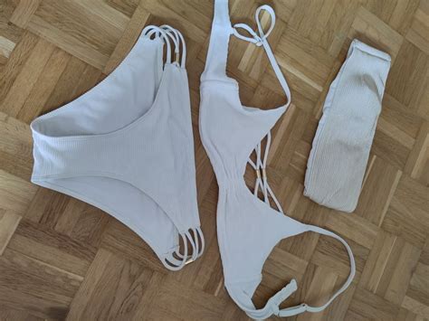 Bikini weiss mit zwei Oberteilen Grösse 38 Gebraucht in Niederuzwil für CHF 15 mit Lieferung