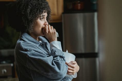 A Sad Woman in Black and White Polka Dots · Free Stock Photo