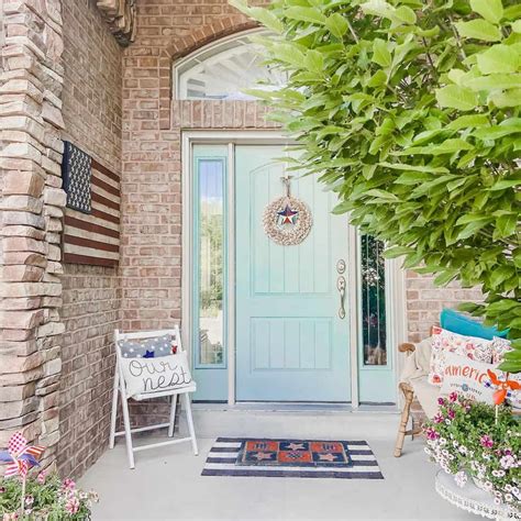 Brick Home with Light Blue Farmhouse Front Door - Soul & Lane