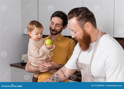 Smiling Gay Man Holding Daughter With Stock Image Image Of Baby Caucasian