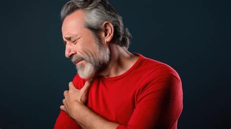 Premium Ai Image Mature Man Suffering From Arthritis In The Shoulder