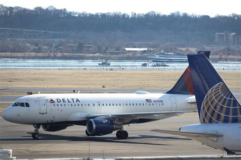 Delta plane and Air Force jet ordered to maneuver to avoid collision