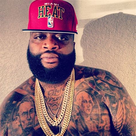 Rick Ross chest tattoos with USA presidents