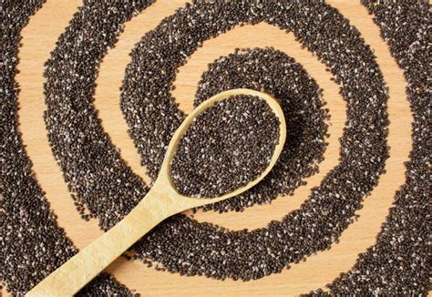 Healthy Chia Seeds In A Wooden Spoon On A Wooden Table Stock Image