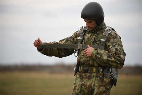 KOVIN, Serbia -- A Serbian Paratrooper begins to derig - NARA & DVIDS ...