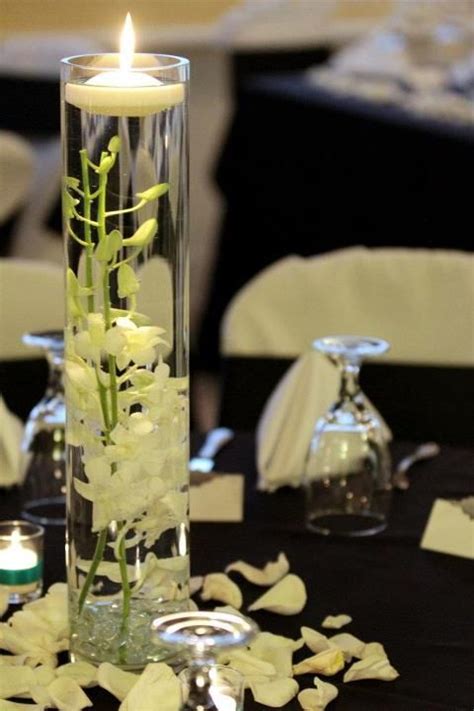 Submerged Orchid Wedding Centerpiece With Floating Candle And Rose