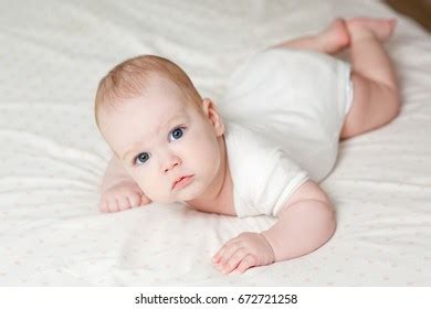 Naked Cute Baby Girl On Light Stock Photo Edit Now 1689213154