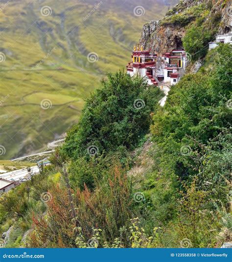 Tibetan Drak Yerpa Buddhist Monastery On The Cliff In Mountains Of