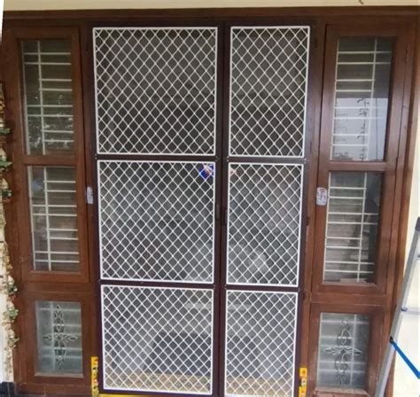 Modern Aluminum Grill Hinged Door For Home At Rs Sq Ft In