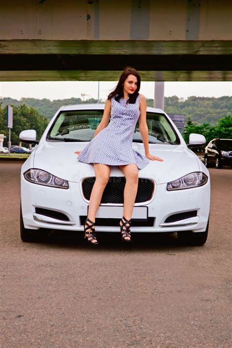 Cute Brunette And Luxury Car Stock Photo Image Of Cowl High