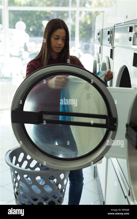 Woman In Laundromat Hi Res Stock Photography And Images Alamy