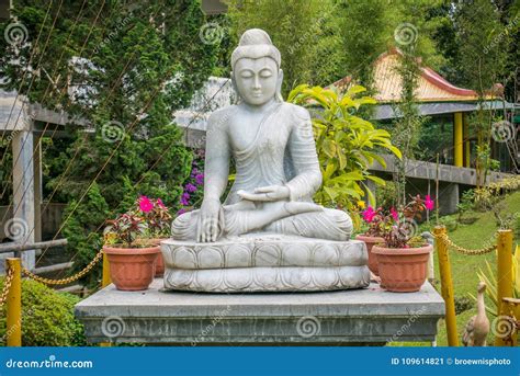 Buddhist Statue in a Garden Stock Image - Image of natural, sculpture ...