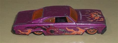 Carrinho Hot Wheels Impala 65 1996 Brinquedo para Bebês Hot Wheels Usado 90299684 enjoei