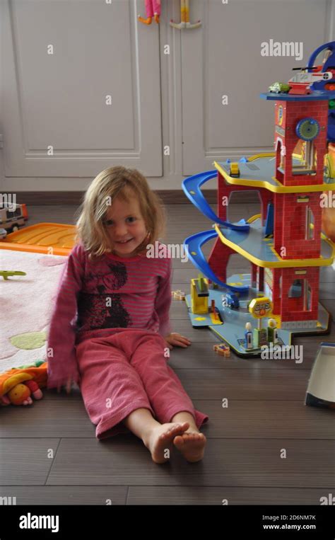 Little girl playing in her bedroom Stock Photo - Alamy