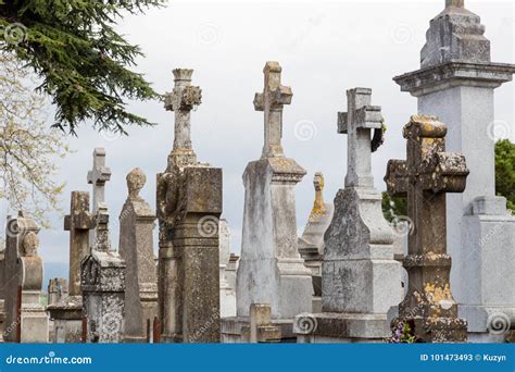 French Cemetery With Old Stone Tombstones And Crosses In Carcass Stock