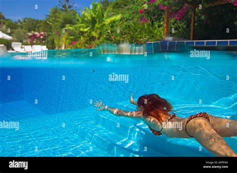 Woman In Bikini Diving Underwater In Swimming Pool Hotel Above Water 57936 Hot Sex Picture