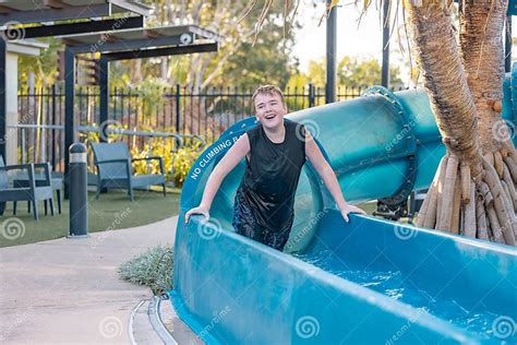 Kids Enjoying Water Slide Splash Park at Tropical Australian Caravan ...