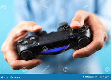 Male Hands Holding A Ps4 Controller Editorial Stock Image Image Of